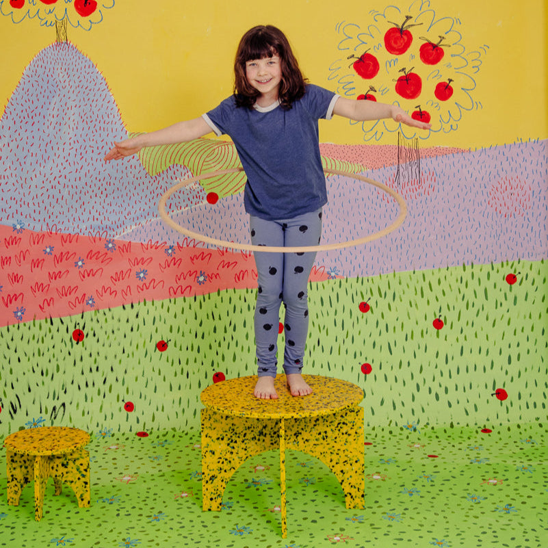 KID ON M1N3 TABLE IN SUNBURST YELLOW BY THE MINIMONO PROJECT - BRAND FOR ECO FRIENDLY - PLAYFUL - MULTI FUNCTIONAL - SUSTAINABLE - HIGH QUALITY - CIRCULAR DESIGN FURNITURE FROM RECYCLED PLASTIC FOR BOTH ADULT AND CHILDREN MADE IN BERLIN GERMANY