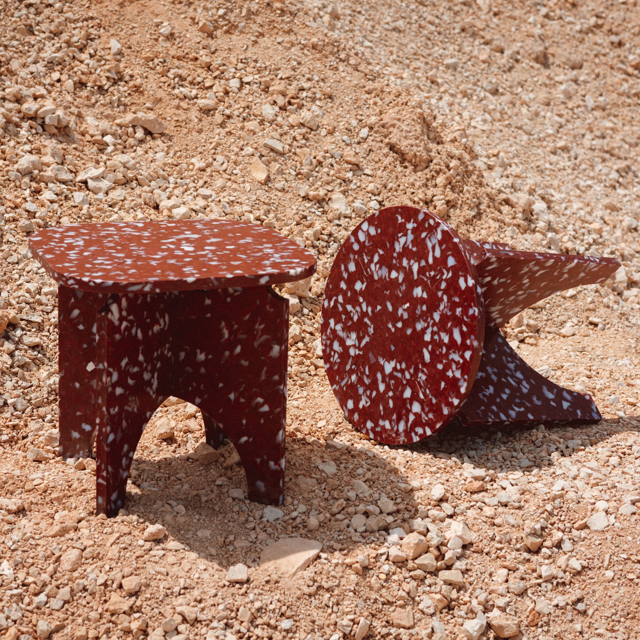TWO RED STOOLS BY THE MINIMONO PROJECT - BRAND FOR ECO FRIENDLY - PLAYFUL - MULTI FUNCTIONAL - SUSTAINABLE - HIGH QUALITY - DESIGN FURNITURE FROM RECYCLED PLASTIC FOR BOTH ADULT AND CHILDREN MADE IN BERLIN GERMANY