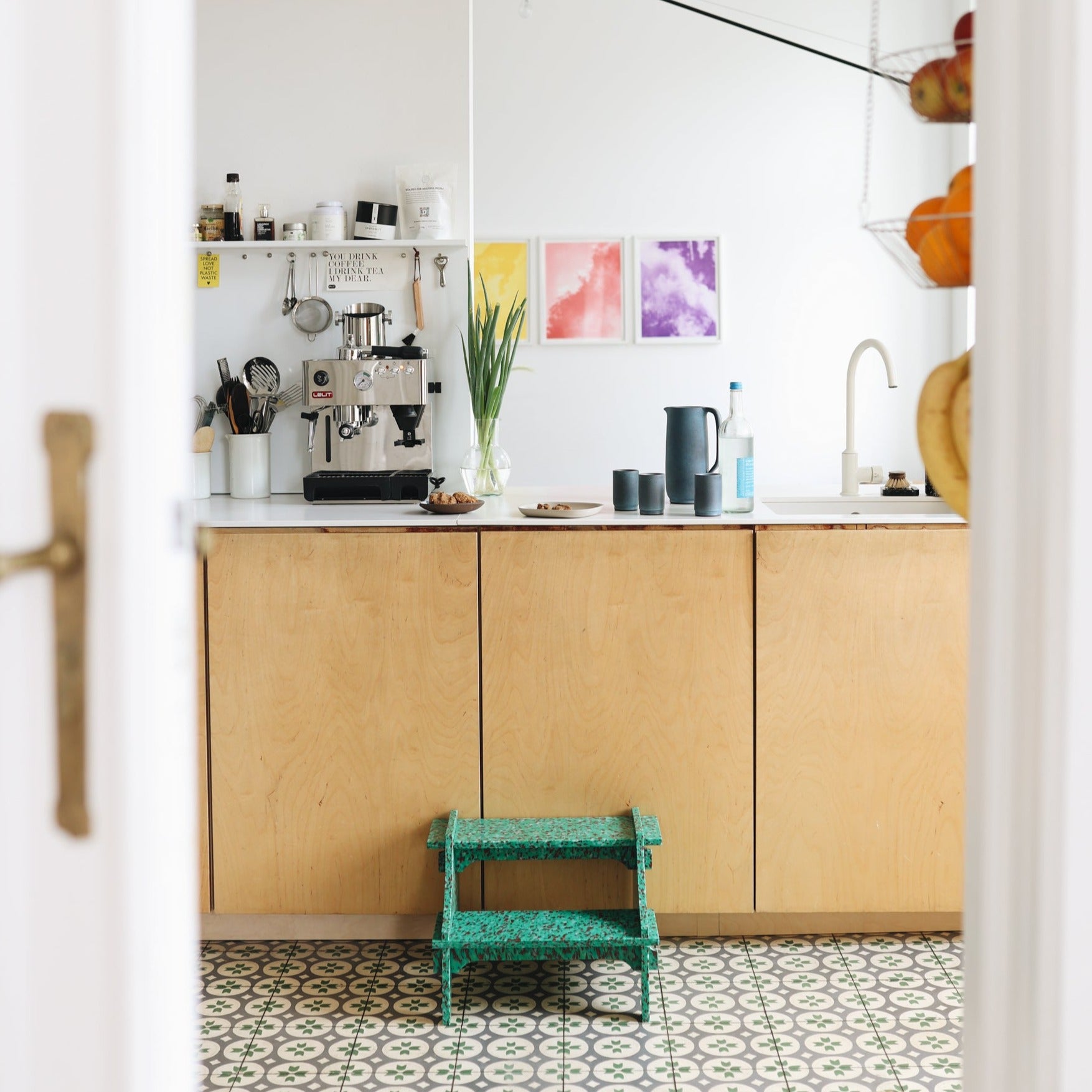 GREEN STEP STOOL IN KITCHEN BY THE MINIMONO PROJECT - BRAND FOR ECO FRIENDLY - PLAYFUL - MULTI FUNCTIONAL - SUSTAINABLE - HIGH QUALITY - DESIGN FURNITURE FROM RECYCLED PLASTIC FOR BOTH ADULT AND CHILDREN MADE IN BERLIN GERMANY