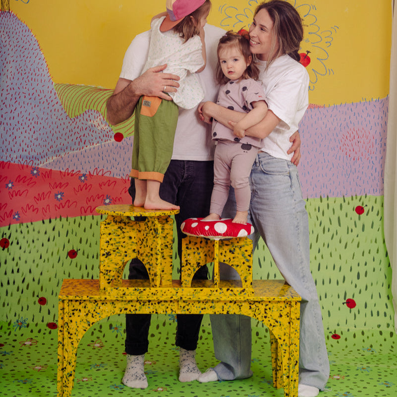 FAMILY WITH M1N1 AND M1N2 STOOLS AND M4N1 BENCH OR KIDS DESK IN SUNBURST YELLOW BY THE MINIMONO PROJECT - BRAND FOR ECO FRIENDLY - PLAYFUL - MULTI FUNCTIONAL - SUSTAINABLE - HIGH QUALITY - CIRCULAR DESIGN FURNITURE FROM RECYCLED PLASTIC FOR BOTH ADULT AND CHILDREN MADE IN BERLIN GERMANY