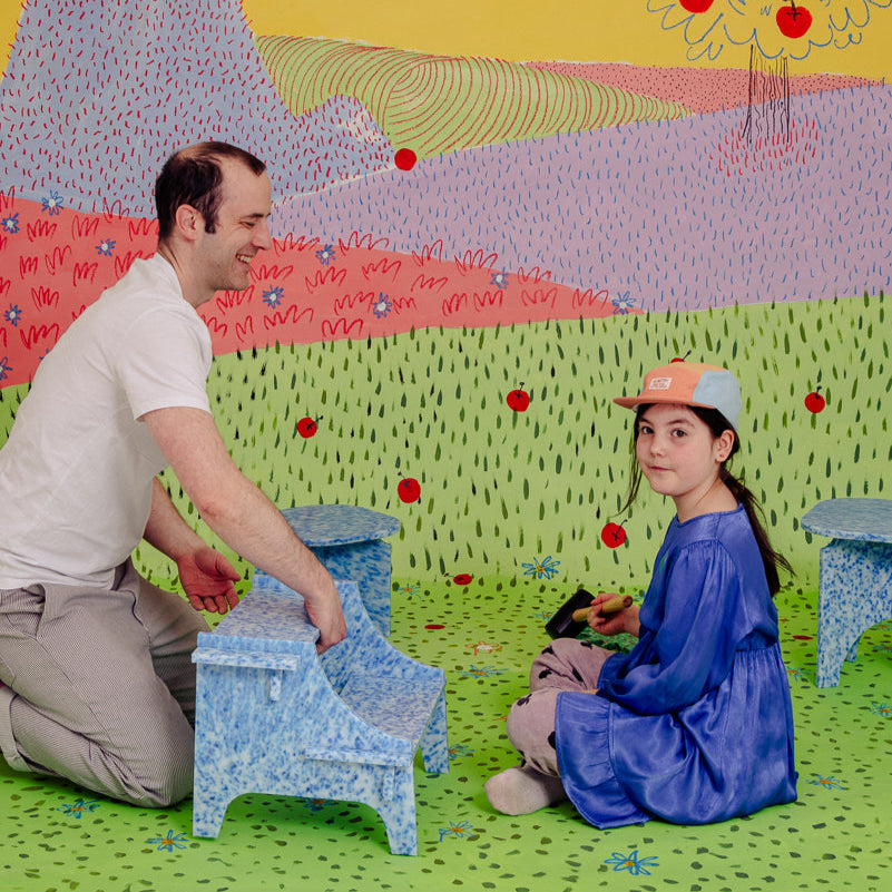 FATHER AND DAUGHTER WITH M2N2 IN ARTIC BLUE BY THE MINIMONO PROJECT - BRAND FOR ECO FRIENDLY - PLAYFUL - MULTI FUNCTIONAL - SUSTAINABLE - HIGH QUALITY - CIRCULAR DESIGN FURNITURE FROM RECYCLED PLASTIC FOR BOTH ADULT AND CHILDREN MADE IN BERLIN GERMANY