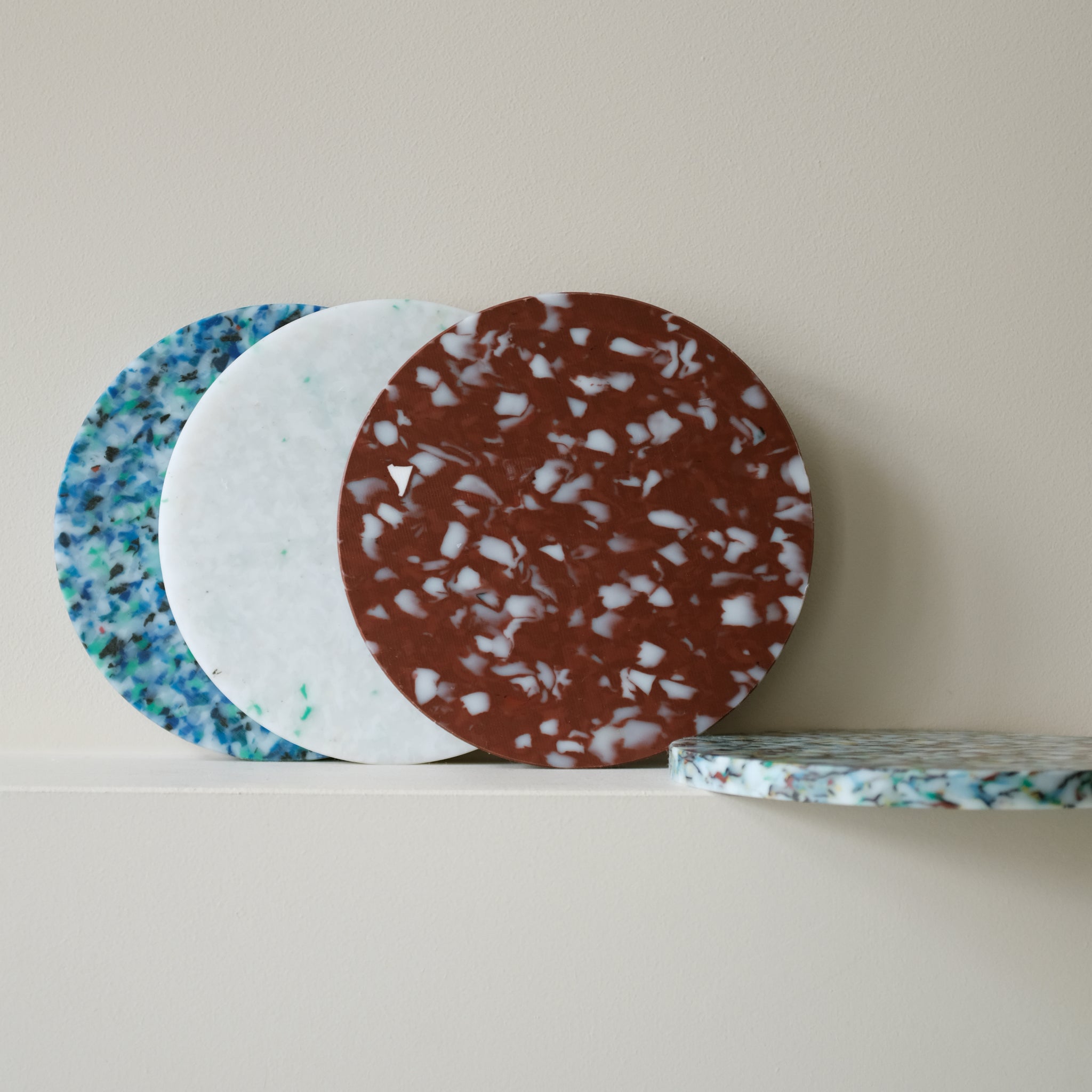 VARIOUS CIRCLE CHARCUTERIE CUTTING BOARDS BY THE MINIMONO PROJECT - BRAND FOR ECO FRIENDLY - PLAYFUL - MULTI FUNCTIONAL - SUSTAINABLE - HIGH QUALITY - DESIGN FURNITURE FROM RECYCLED PLASTIC FOR BOTH ADULT AND CHILDREN MADE IN BERLIN GERMANY