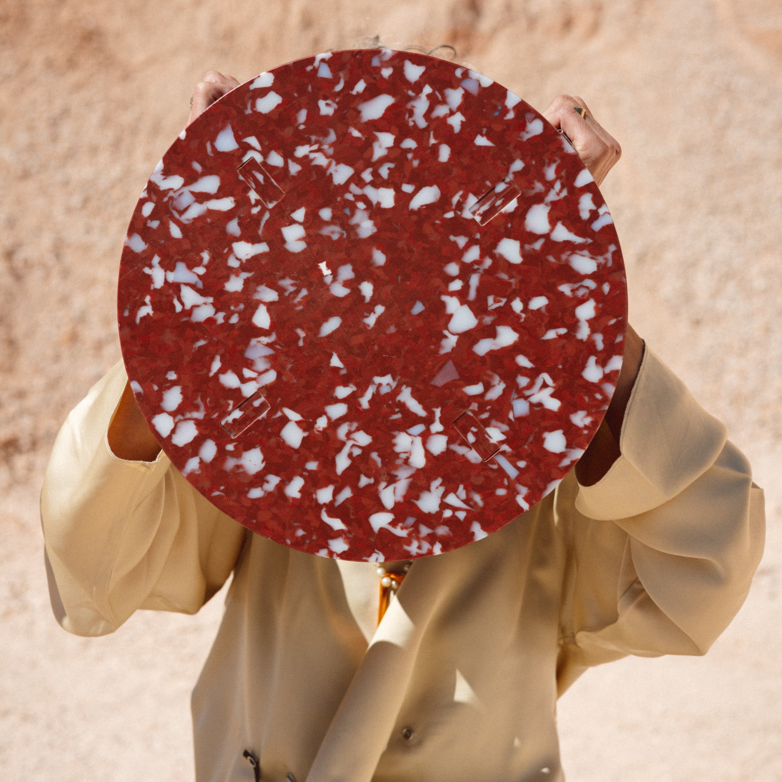PERSON WITH RED STOOL BY THE MINIMONO PROJECT - BRAND FOR ECO FRIENDLY - PLAYFUL - MULTI FUNCTIONAL - SUSTAINABLE - HIGH QUALITY - DESIGN FURNITURE FROM RECYCLED PLASTIC FOR BOTH ADULT AND CHILDREN MADE IN BERLIN GERMANY