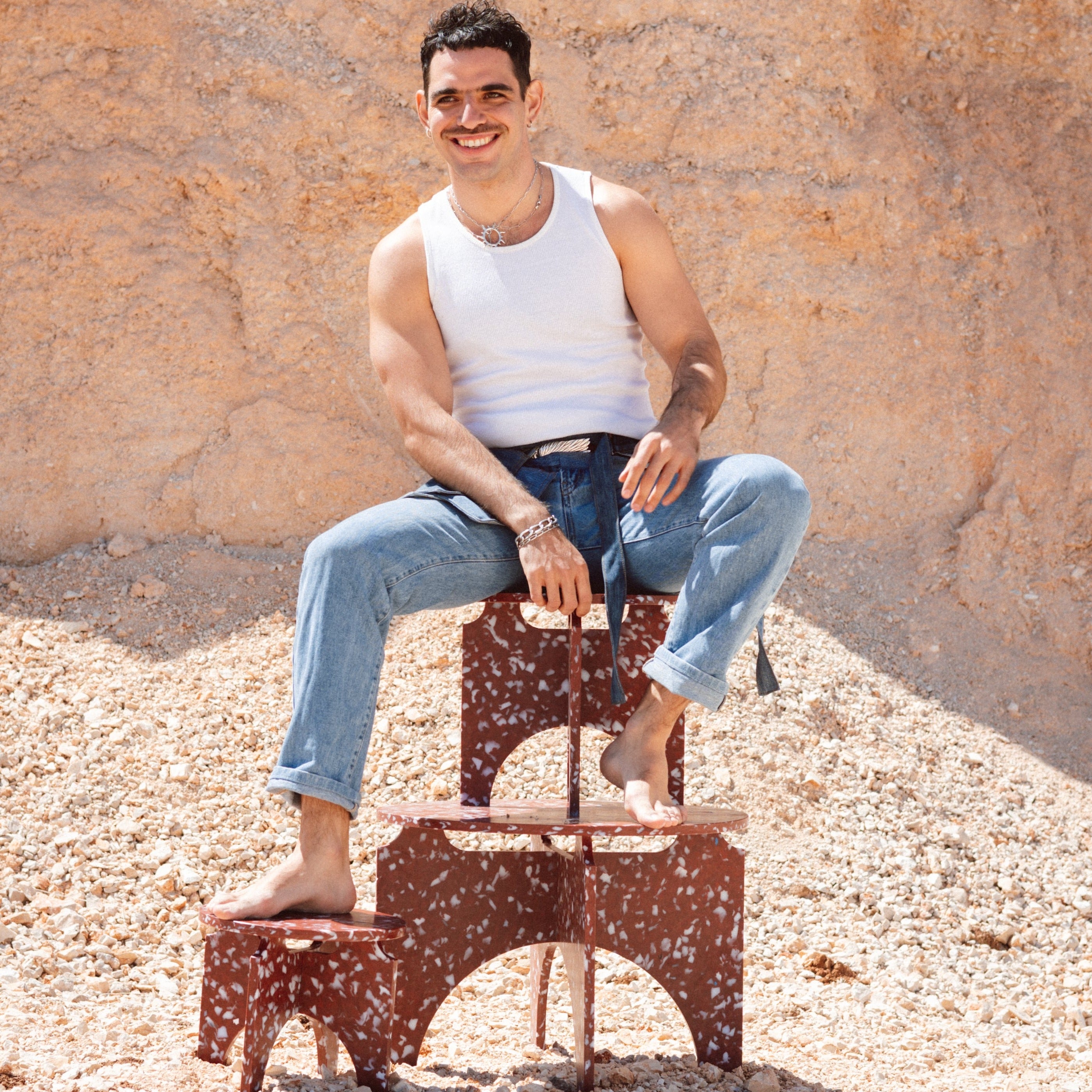 OMAR SITTING ON STOOLS AND TABLE BY THE MINIMONO PROJECT - BRAND FOR ECO FRIENDLY - PLAYFUL - MULTI FUNCTIONAL - SUSTAINABLE - HIGH QUALITY - DESIGN FURNITURE FROM RECYCLED PLASTIC FOR BOTH ADULT AND CHILDREN MADE IN BERLIN GERMANY