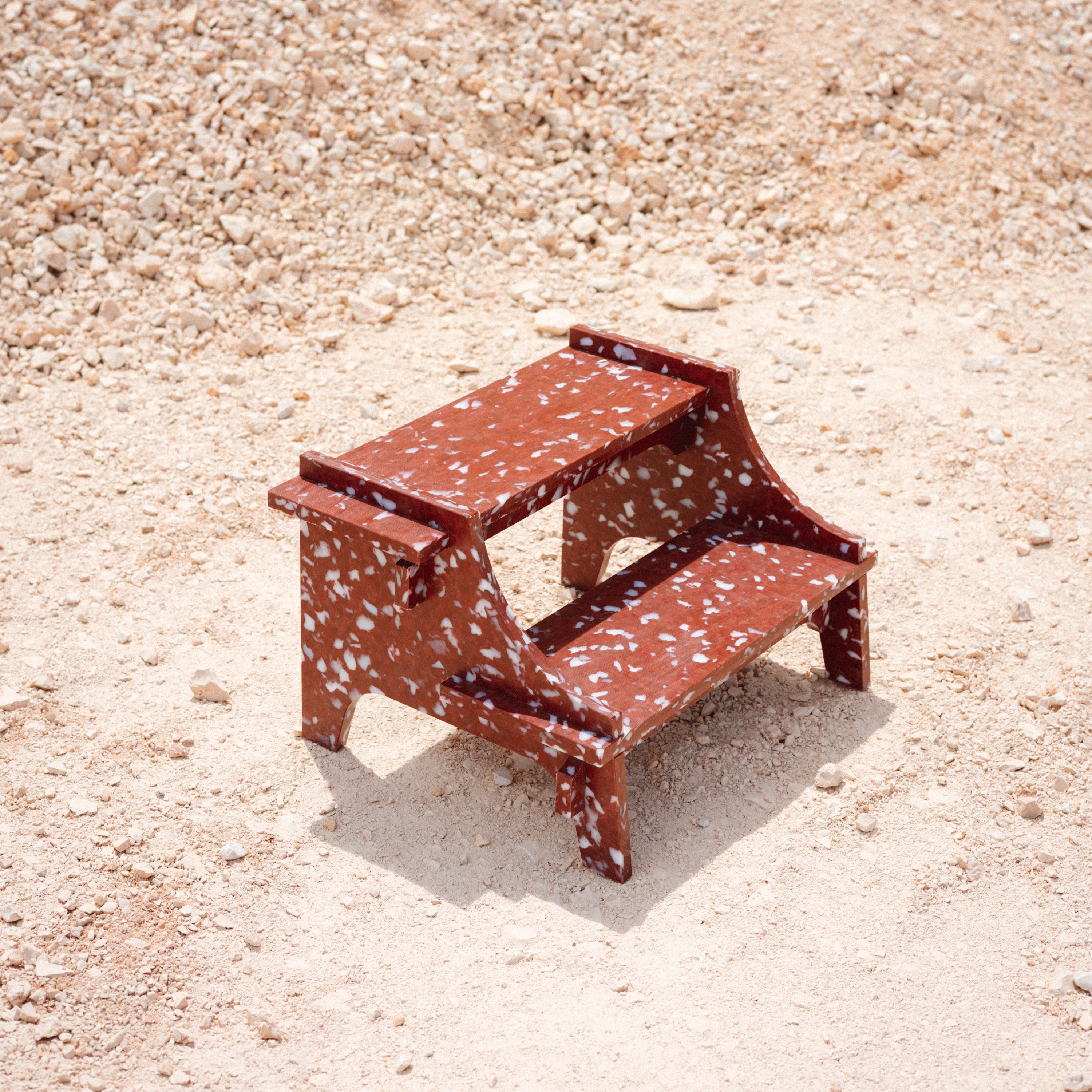 RED SMALL STEP STOOL BY THE MINIMONO PROJECT - BRAND FOR ECO FRIENDLY - PLAYFUL - MULTI FUNCTIONAL - SUSTAINABLE - HIGH QUALITY - DESIGN FURNITURE FROM RECYCLED PLASTIC FOR BOTH ADULT AND CHILDREN MADE IN BERLIN GERMANY
