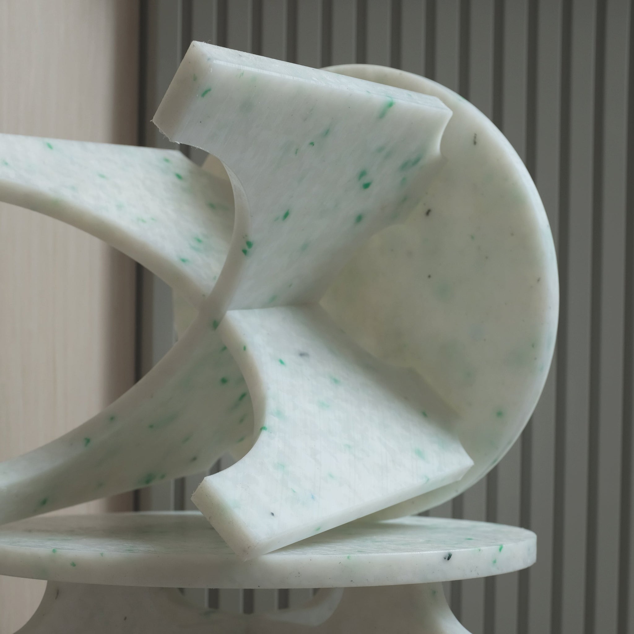 DETAIL OF WHITE STOOL BY THE MINIMONO PROJECT - BRAND FOR ECO FRIENDLY - PLAYFUL - MULTI FUNCTIONAL - SUSTAINABLE - HIGH QUALITY - DESIGN FURNITURE FROM RECYCLED PLASTIC FOR BOTH ADULT AND CHILDREN MADE IN BERLIN GERMANY