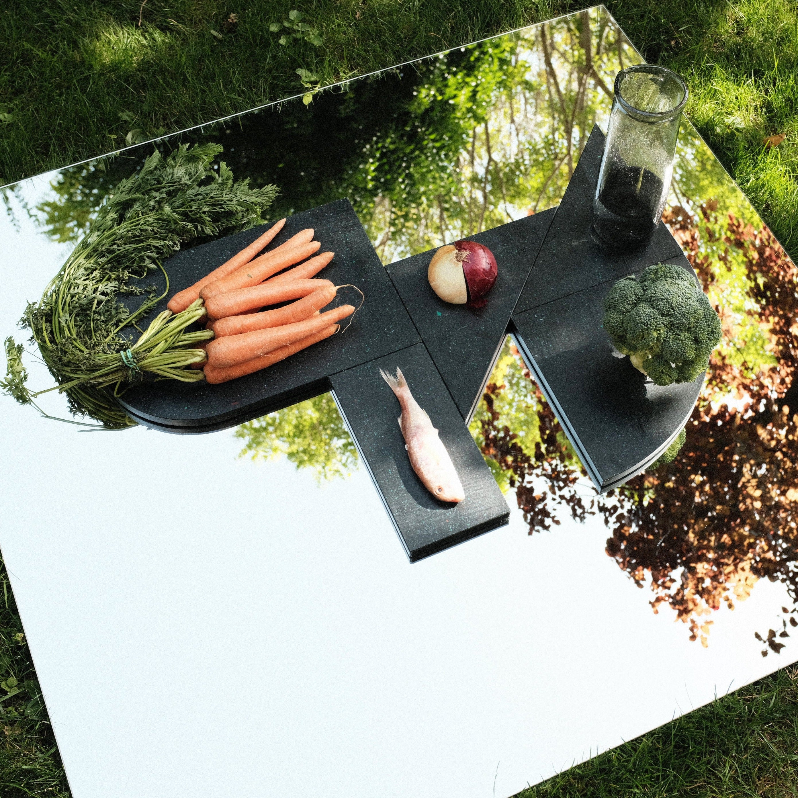 SET OF BLACK CHARCUTERIE CUTTING BOARDS WITH FOOD BY THE MINIMONO PROJECT - BRAND FOR ECO FRIENDLY - PLAYFUL - MULTI FUNCTIONAL - SUSTAINABLE - HIGH QUALITY - DESIGN FURNITURE FROM RECYCLED PLASTIC FOR BOTH ADULT AND CHILDREN MADE IN BERLIN GERMANY