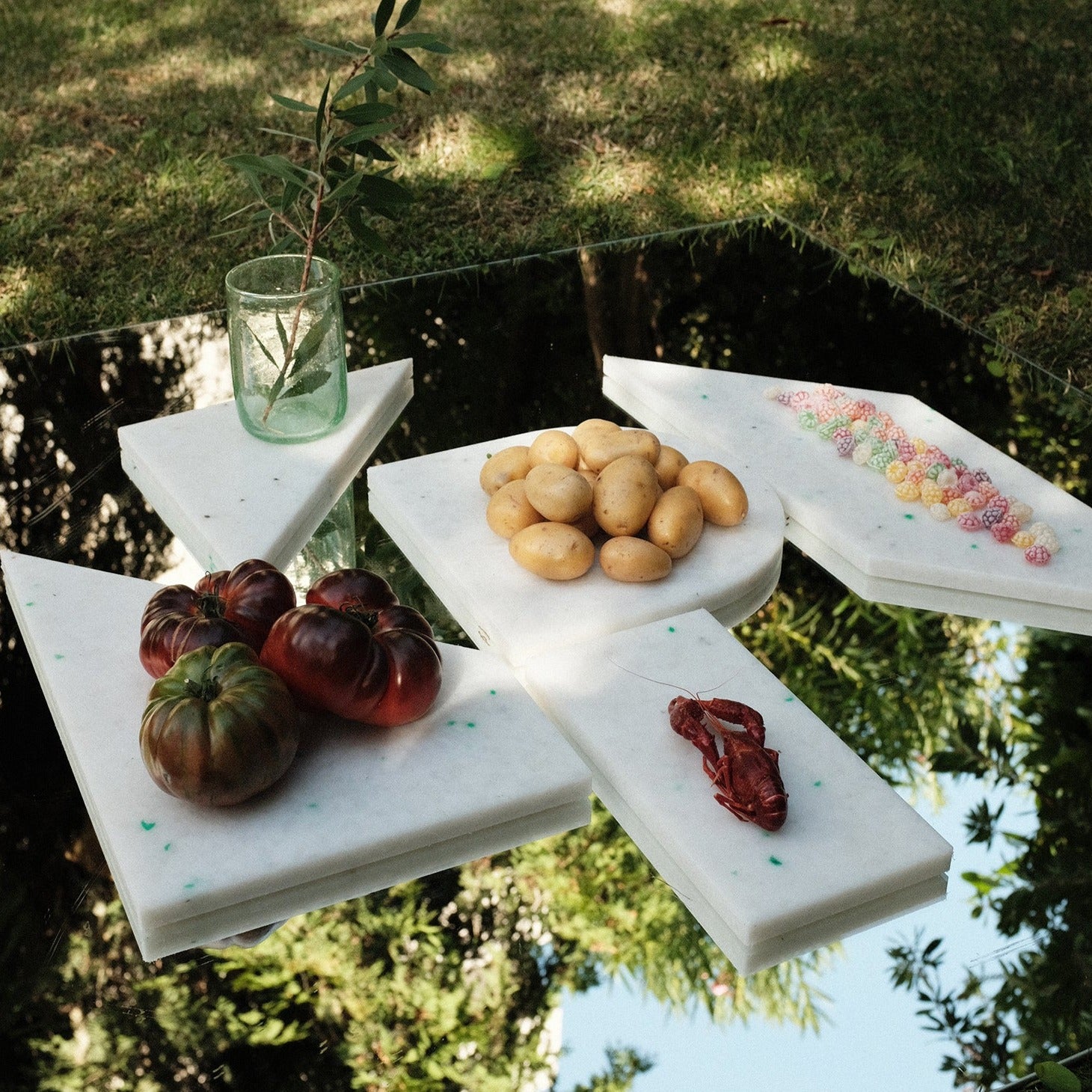 SET OF WHITE CHARCUTERIE CUTTING BOARDS ON MIRROR BY THE MINIMONO PROJECT - BRAND FOR ECO FRIENDLY - PLAYFUL - MULTI FUNCTIONAL - SUSTAINABLE - HIGH QUALITY - DESIGN FURNITURE FROM RECYCLED PLASTIC FOR BOTH ADULT AND CHILDREN MADE IN BERLIN GERMANY