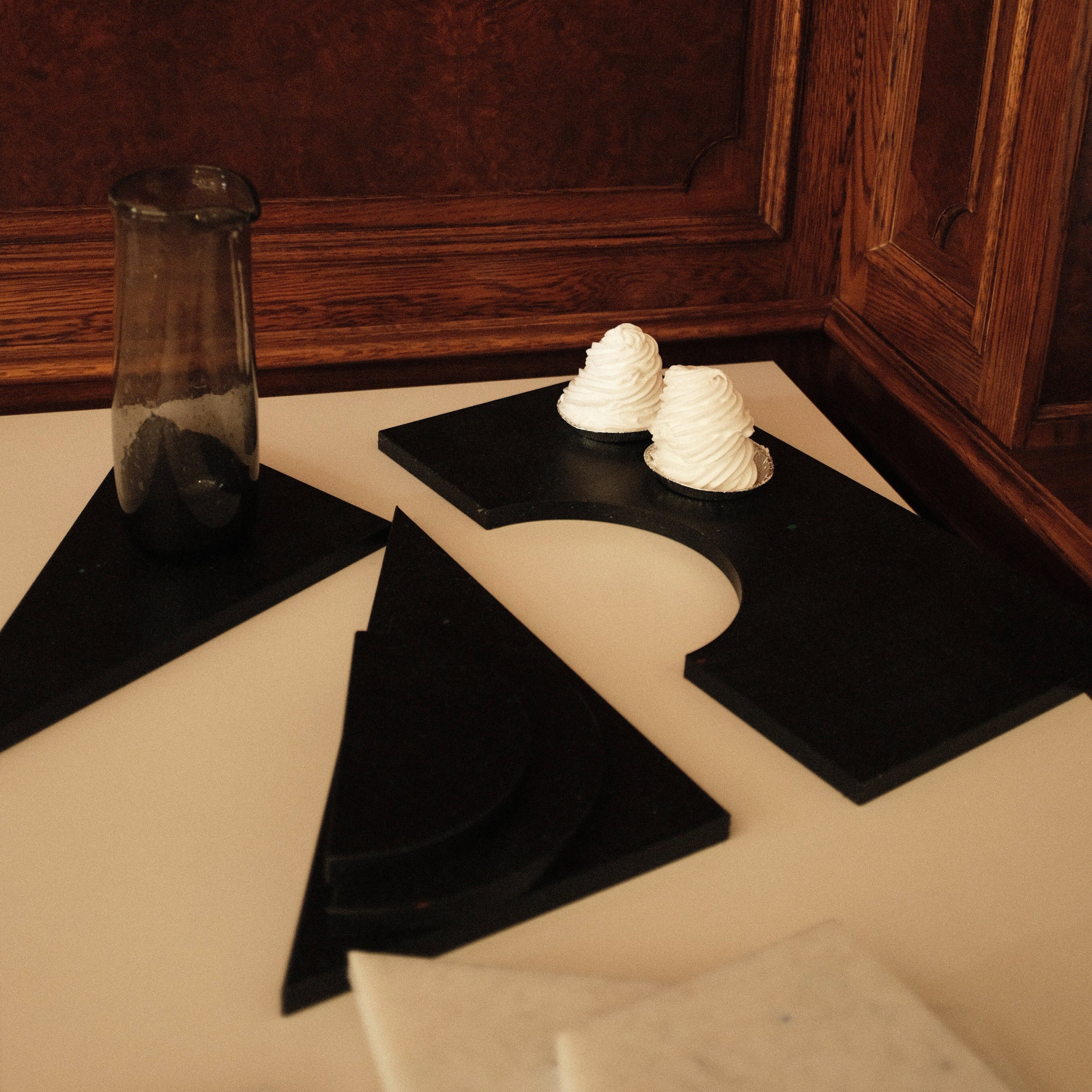 DETAIL OF BLACK CHARCUTERIE CUTTING BOARDS BY THE MINIMONO PROJECT - BRAND FOR ECO FRIENDLY - PLAYFUL - MULTI FUNCTIONAL - SUSTAINABLE - HIGH QUALITY - DESIGN FURNITURE FROM RECYCLED PLASTIC FOR BOTH ADULT AND CHILDREN MADE IN BERLIN GERMANY