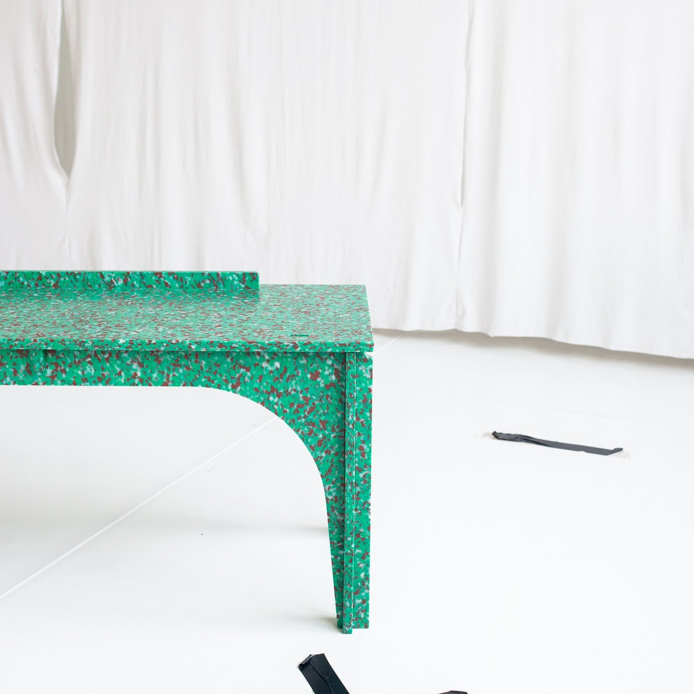 DETAIL OF GREEN BENCH KIDS DESK BY THE MINIMONO PROJECT - BRAND FOR ECO FRIENDLY - PLAYFUL - MULTI FUNCTIONAL - SUSTAINABLE - HIGH QUALITY - DESIGN FURNITURE FROM RECYCLED PLASTIC FOR BOTH ADULT AND CHILDREN MADE IN BERLIN GERMANY