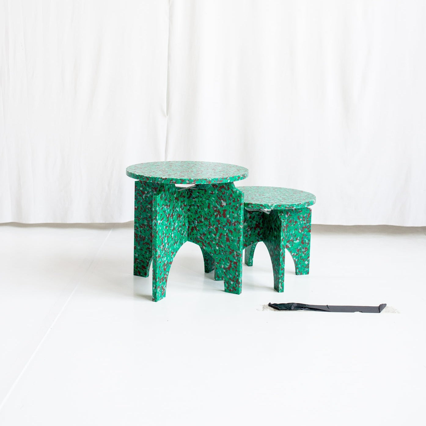TWO GREEN STOOLS BY THE MINIMONO PROJECT - BRAND FOR ECO FRIENDLY - PLAYFUL - MULTI FUNCTIONAL - SUSTAINABLE - HIGH QUALITY - DESIGN FURNITURE FROM RECYCLED PLASTIC FOR BOTH ADULT AND CHILDREN MADE IN BERLIN GERMANY