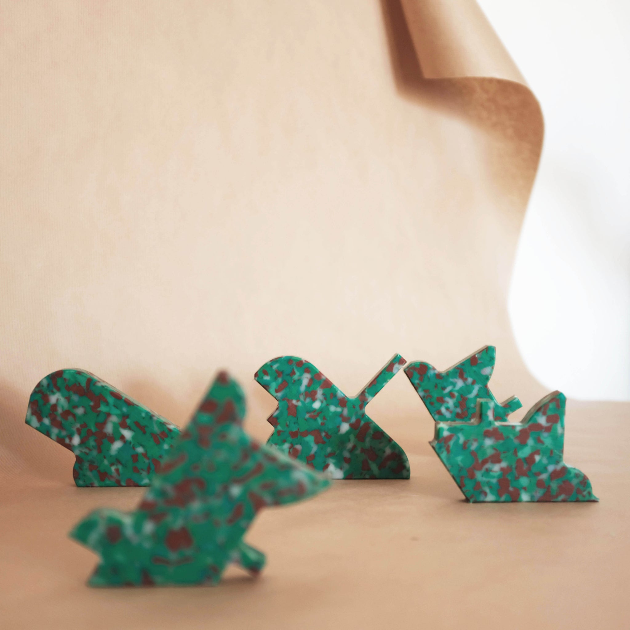 GREEN WALL HOOKS FROM RANDOM PRODUCTION CUT OFFS BY THE MINIMONO PROJECT - BRAND FOR ECO FRIENDLY - PLAYFUL - MULTI FUNCTIONAL - SUSTAINABLE - HIGH QUALITY - DESIGN FURNITURE FROM RECYCLED PLASTIC FOR BOTH ADULT AND CHILDREN MADE IN BERLIN GERMANY